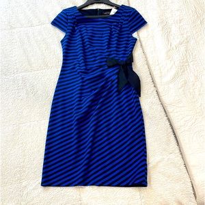 Super flattering dress me with tags.